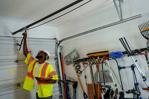 Professional Garage Door Installation technician working in Elgin, IL